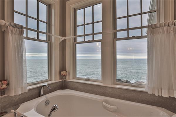 369 Jerusalem Road Cohasset, MA 02025 - Photo 15 of 30 a bathroom with bathtub and window