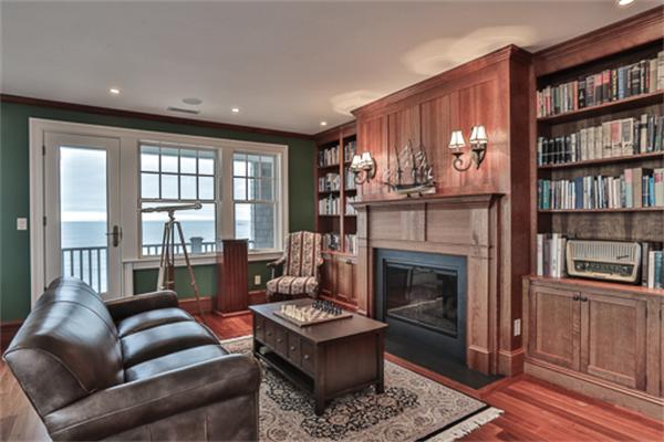 369 Jerusalem Road Cohasset, MA 02025 - Photo 20 of 30 a living room with furniture and a fireplace