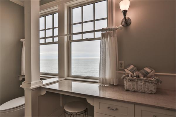 369 Jerusalem Road Cohasset, MA 02025 - Photo 23 of 30 a kitchen with a window a sink and a cabinets