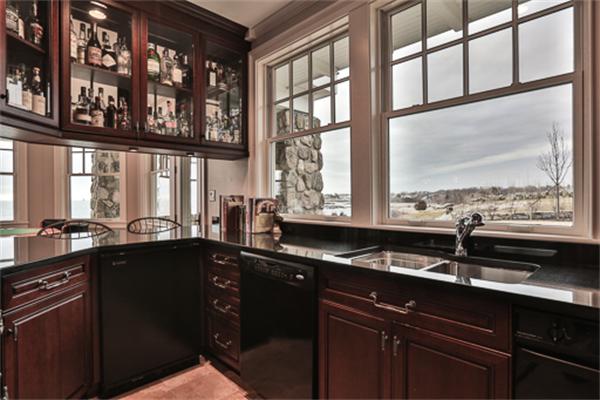 369 Jerusalem Road Cohasset, MA 02025 - Photo 27 of 30 a kitchen with stainless steel appliances a sink and a window