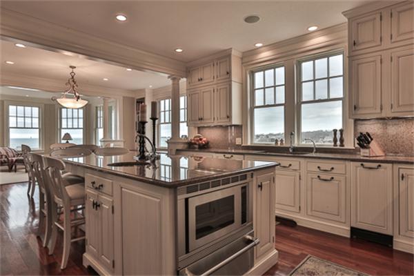 369 Jerusalem Road Cohasset, MA 02025 - Photo 4 of 30 a kitchen with stainless steel appliances granite countertop a sink stove and cabinets