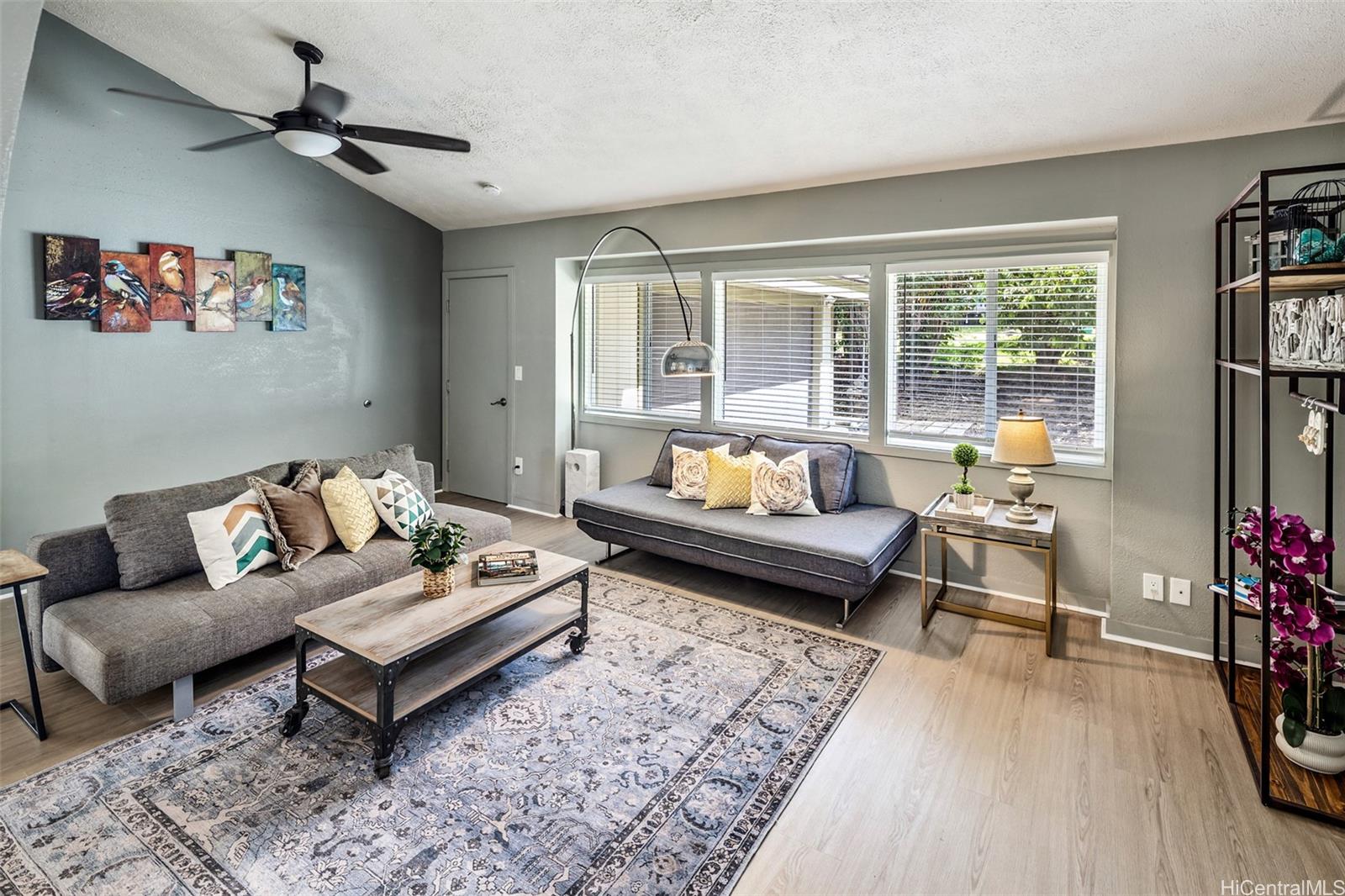 1160 Lunalilo Home Road Honolulu, HI 96825 - Photo 2 of 18 The open living room with high ceilings gives you ample space for your friends and ohana to gather.