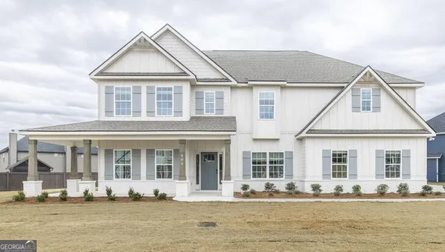 front view of a house with a swimming pool