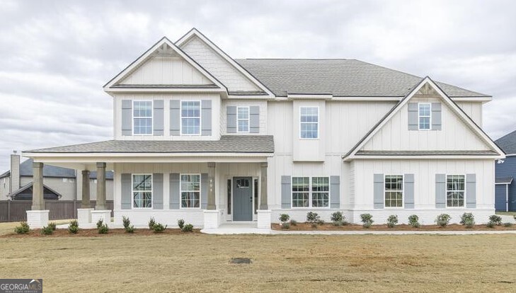 front view of a house with a swimming pool