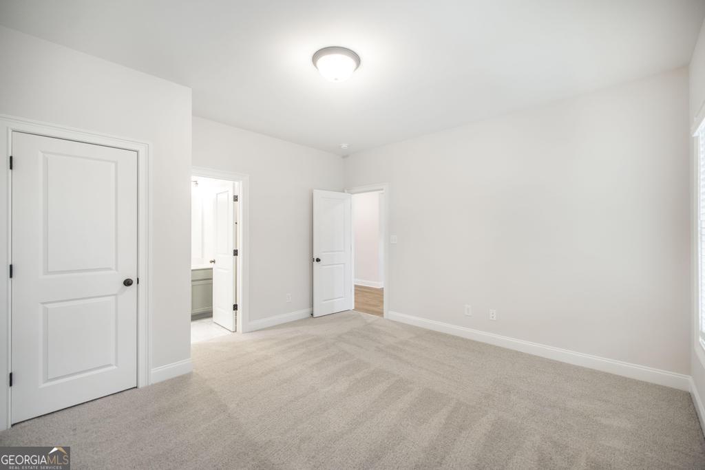 409 Bella Notte Circle, Unit 1D Warner Robins, GA 31088 - Photo 16 of 34 a view of an empty room