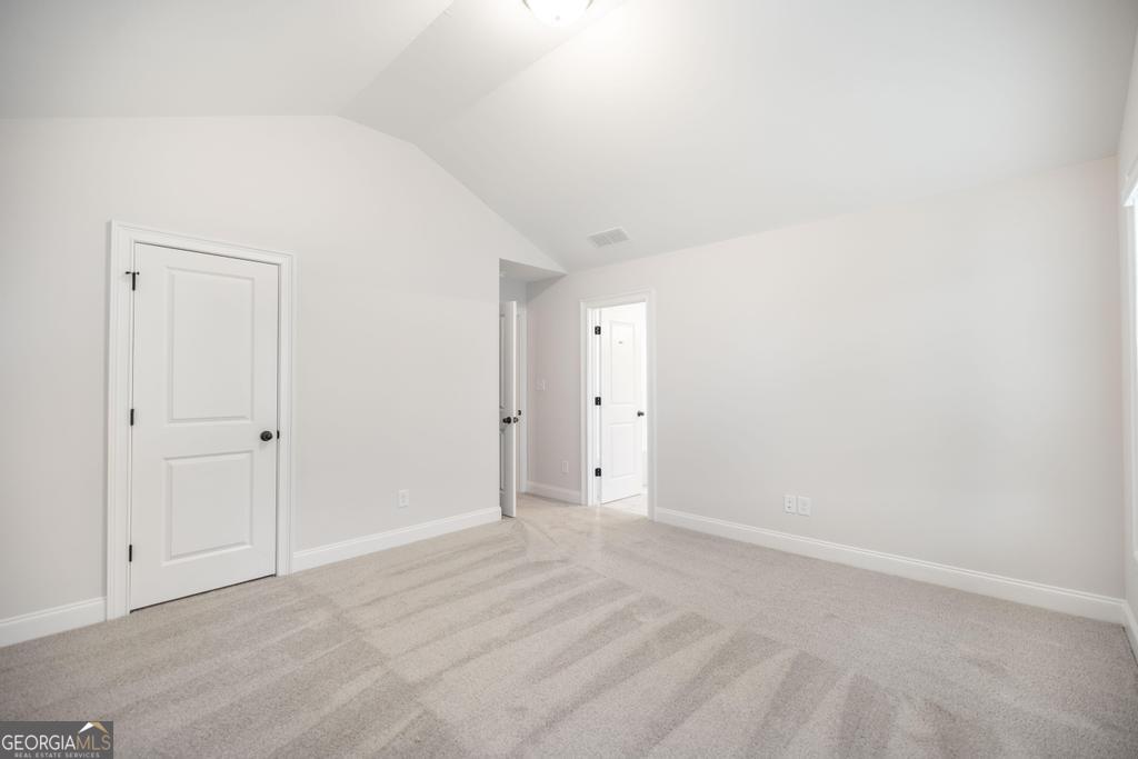 409 Bella Notte Circle, Unit 1D Warner Robins, GA 31088 - Photo 20 of 34 a view of an empty room