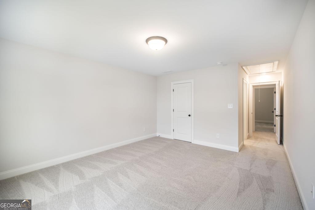 409 Bella Notte Circle, Unit 1D Warner Robins, GA 31088 - Photo 27 of 34 a view of an empty room