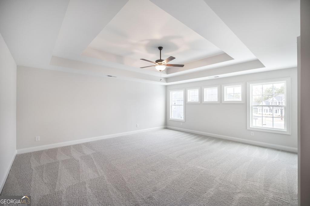 409 Bella Notte Circle, Unit 1D Warner Robins, GA 31088 - Photo 29 of 34 a view of an empty room with a window