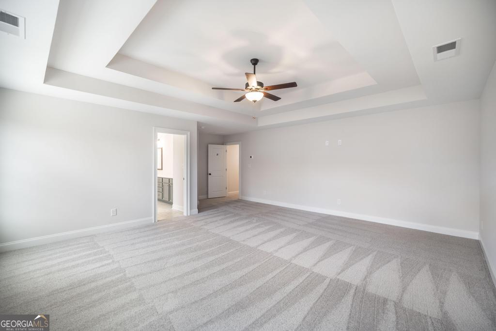 409 Bella Notte Circle, Unit 1D Warner Robins, GA 31088 - Photo 30 of 34 wooden floor in an empty room
