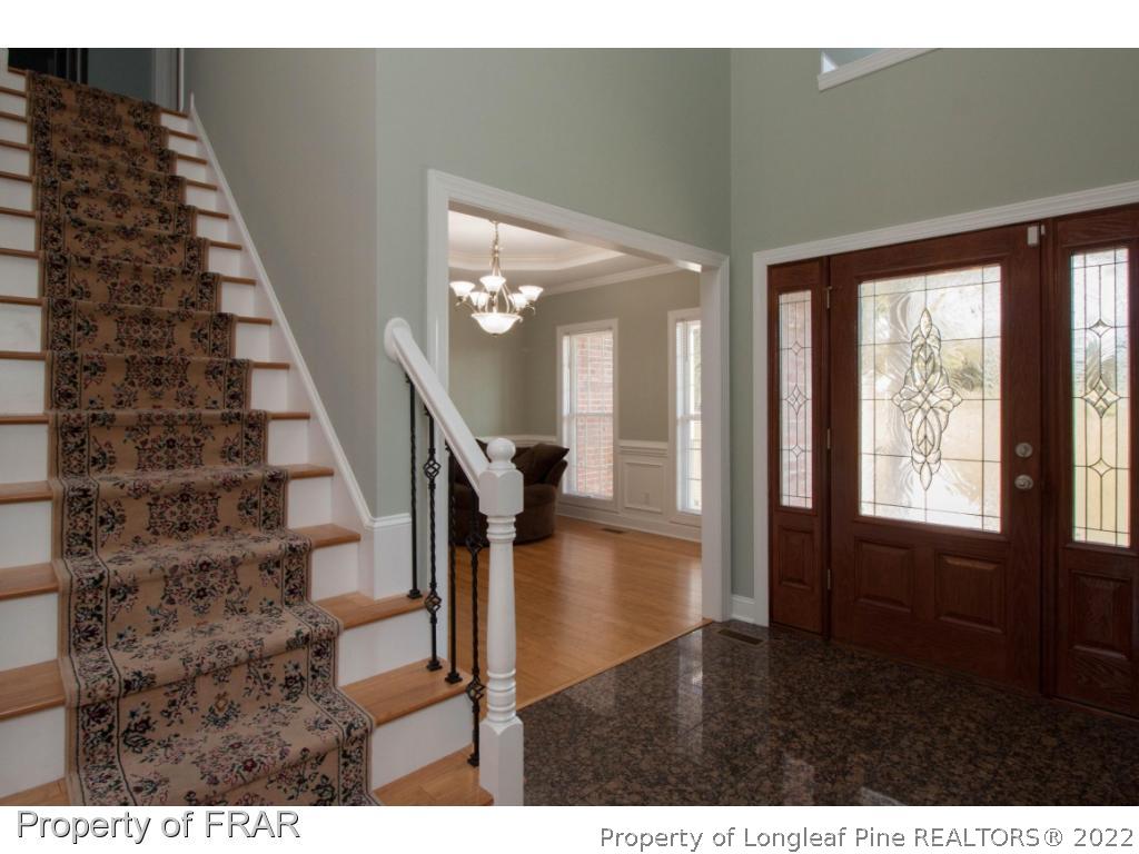 510 Booth Pond Road Raeford, NC 28376 - Photo 15 of 36 a view of entryway and hall with wooden floor