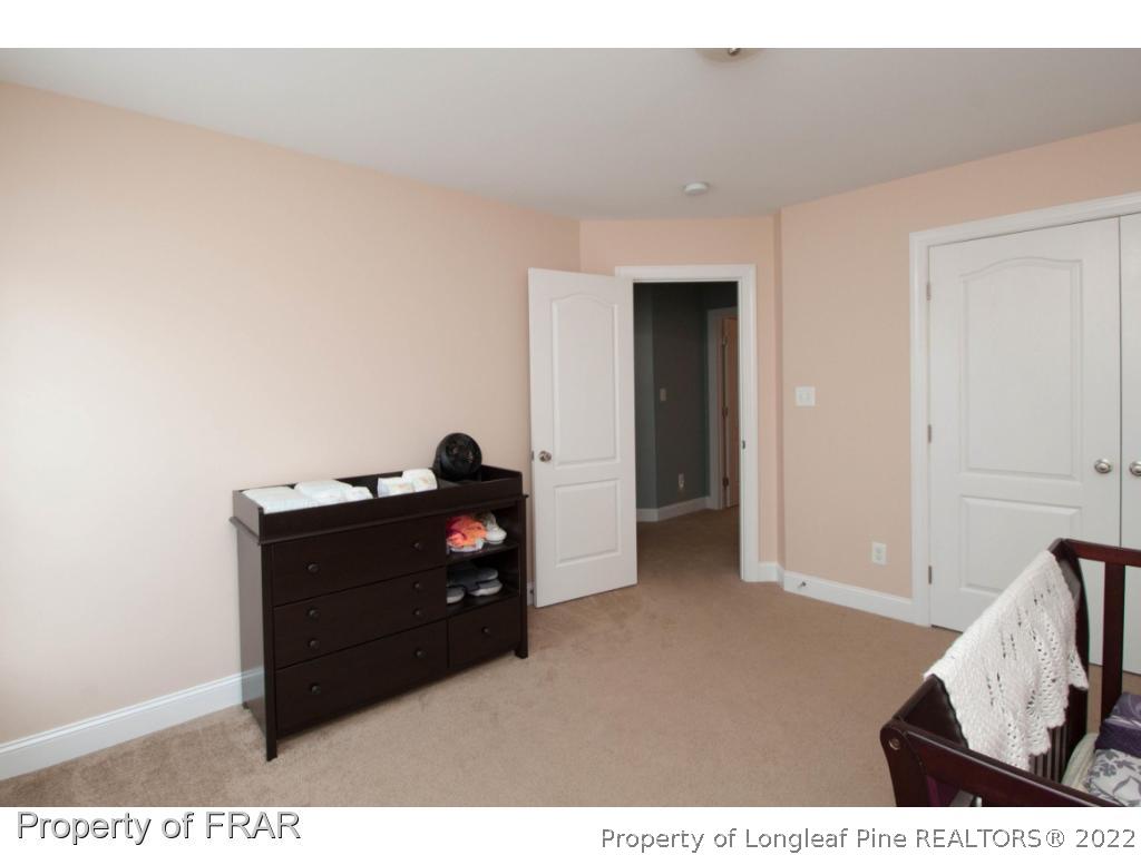 510 Booth Pond Road Raeford, NC 28376 - Photo 29 of 36 a room with a table and a chair