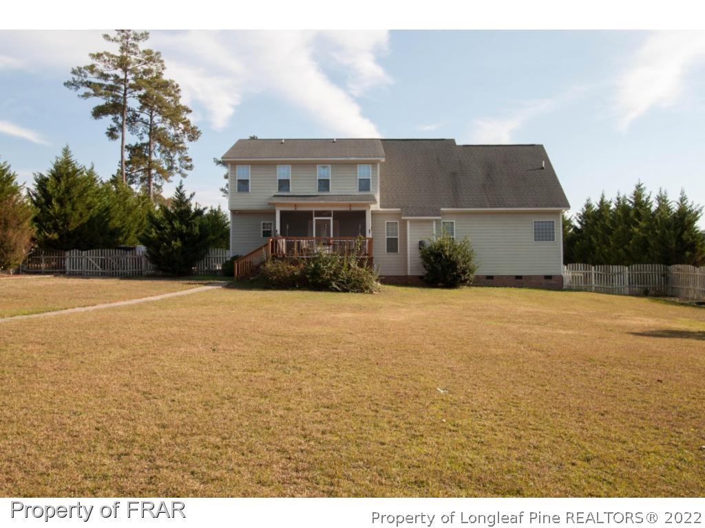 510 Booth Pond Road Raeford, NC 28376 - Photo 5 of 36 a view of house with yard
