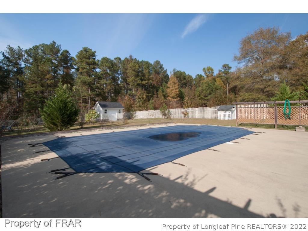 510 Booth Pond Road Raeford, NC 28376 - Photo 9 of 36 a view of a backyard of the house