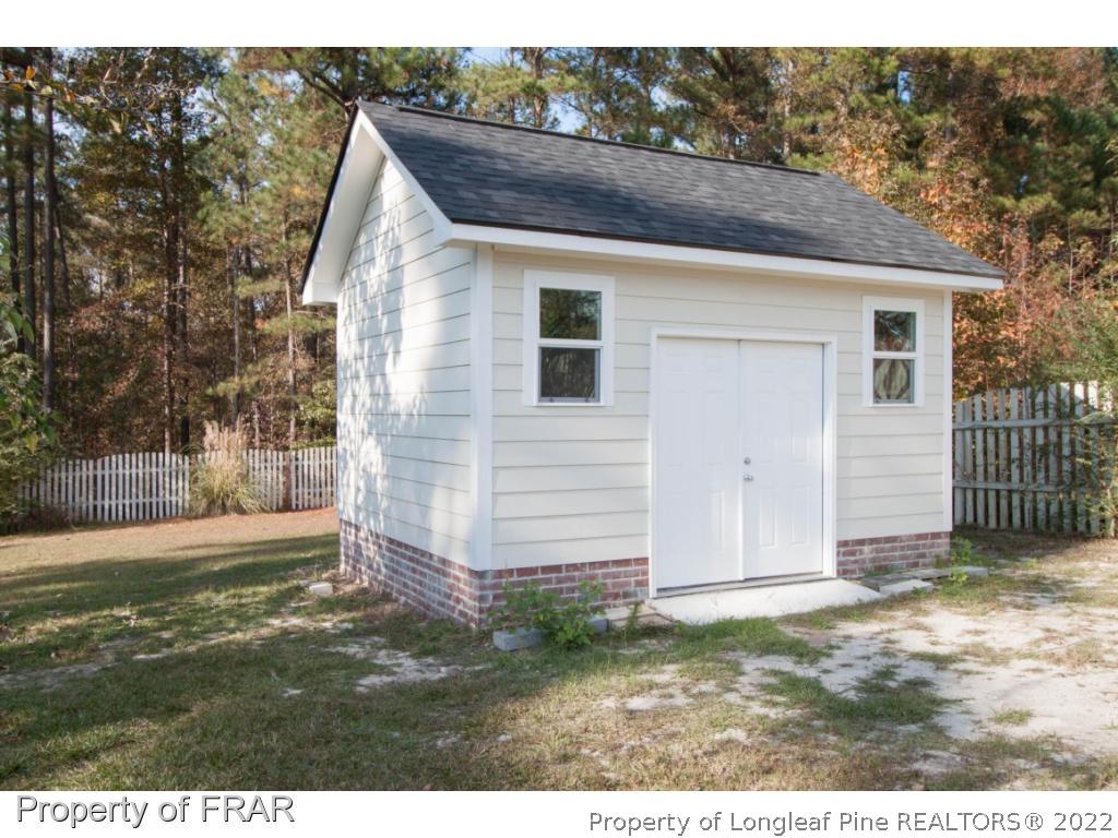 510 Booth Pond Road Raeford, NC 28376 - Photo 10 of 36 a view of a backyard