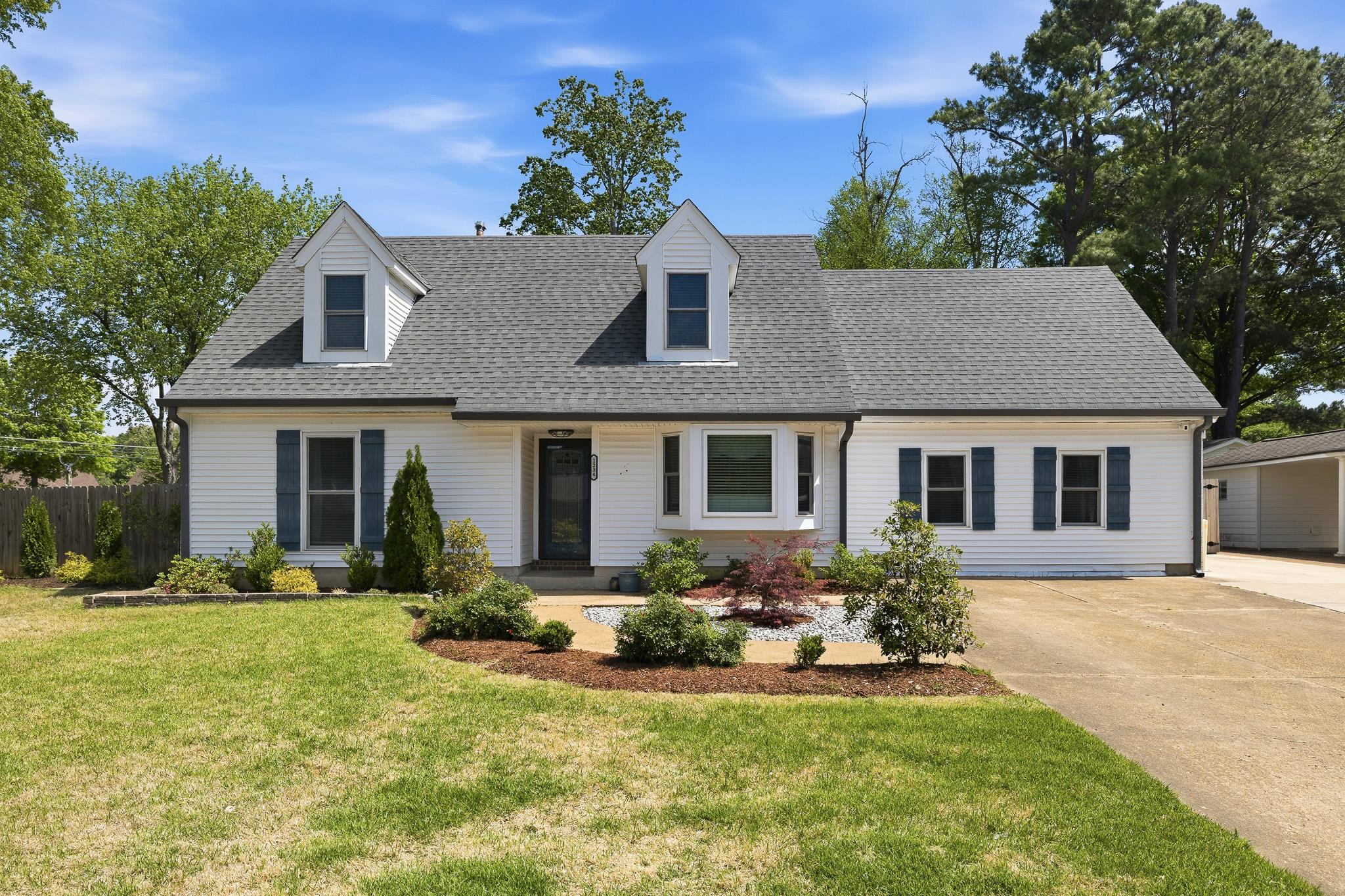 1234 Greenview Road Collierville, TN 38017 - Photo 1 of 33 a front view of house with yard and green space