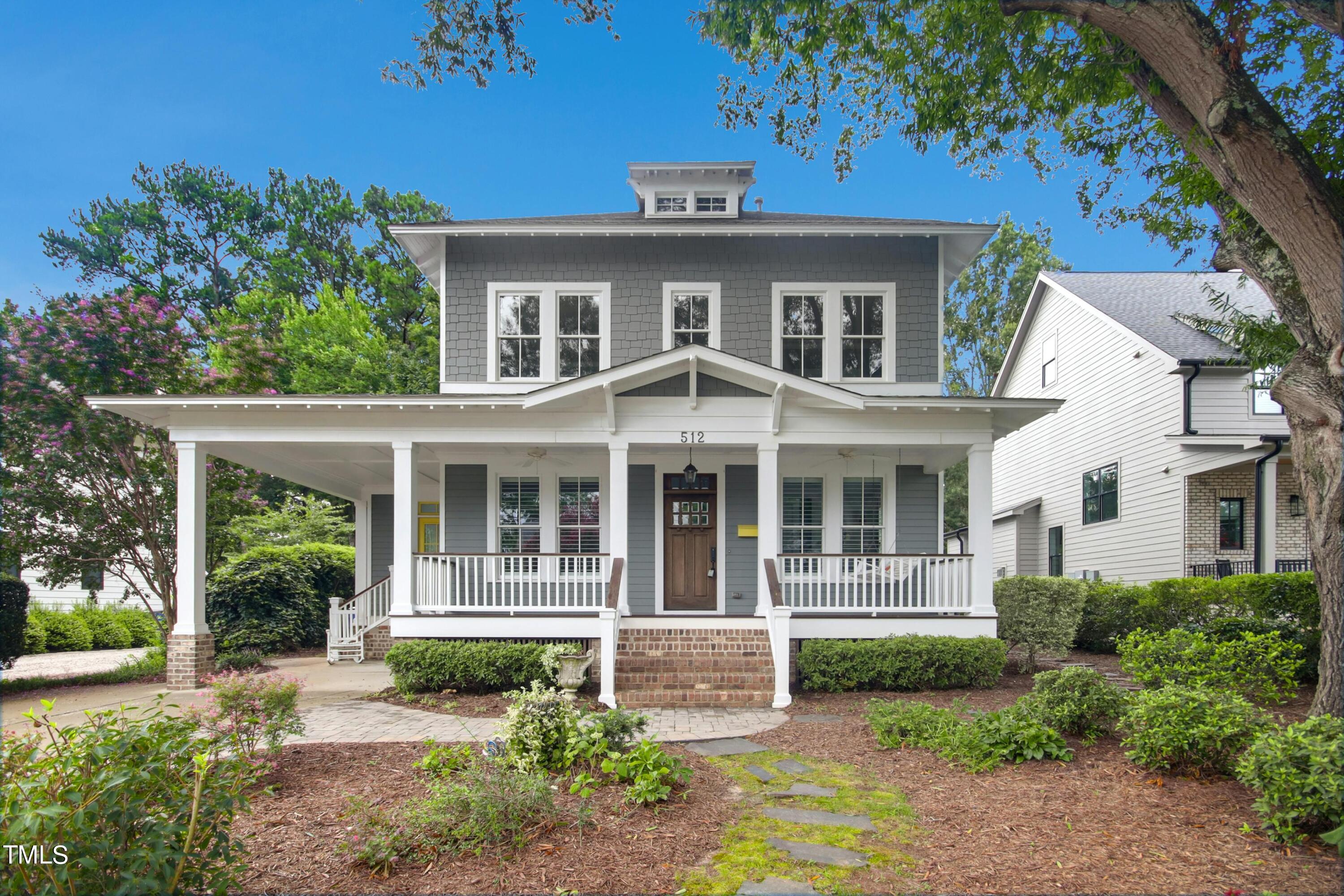 512 Peebles Street Raleigh, NC 27608 - Photo 1 of 45 front view of a house with a yard