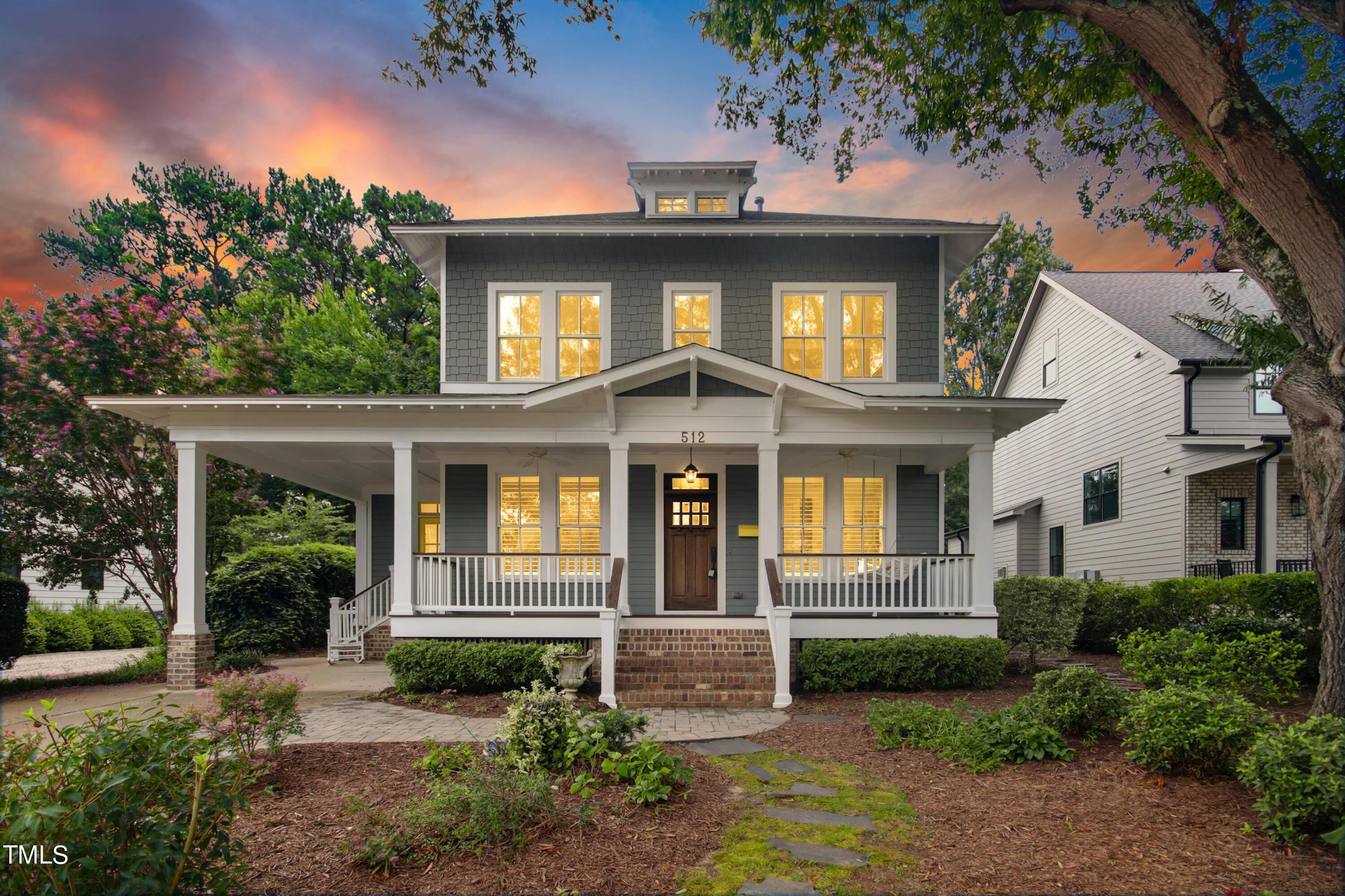 512 Peebles Street Raleigh, NC 27608 - Photo 2 of 45 a front view of a house with garden