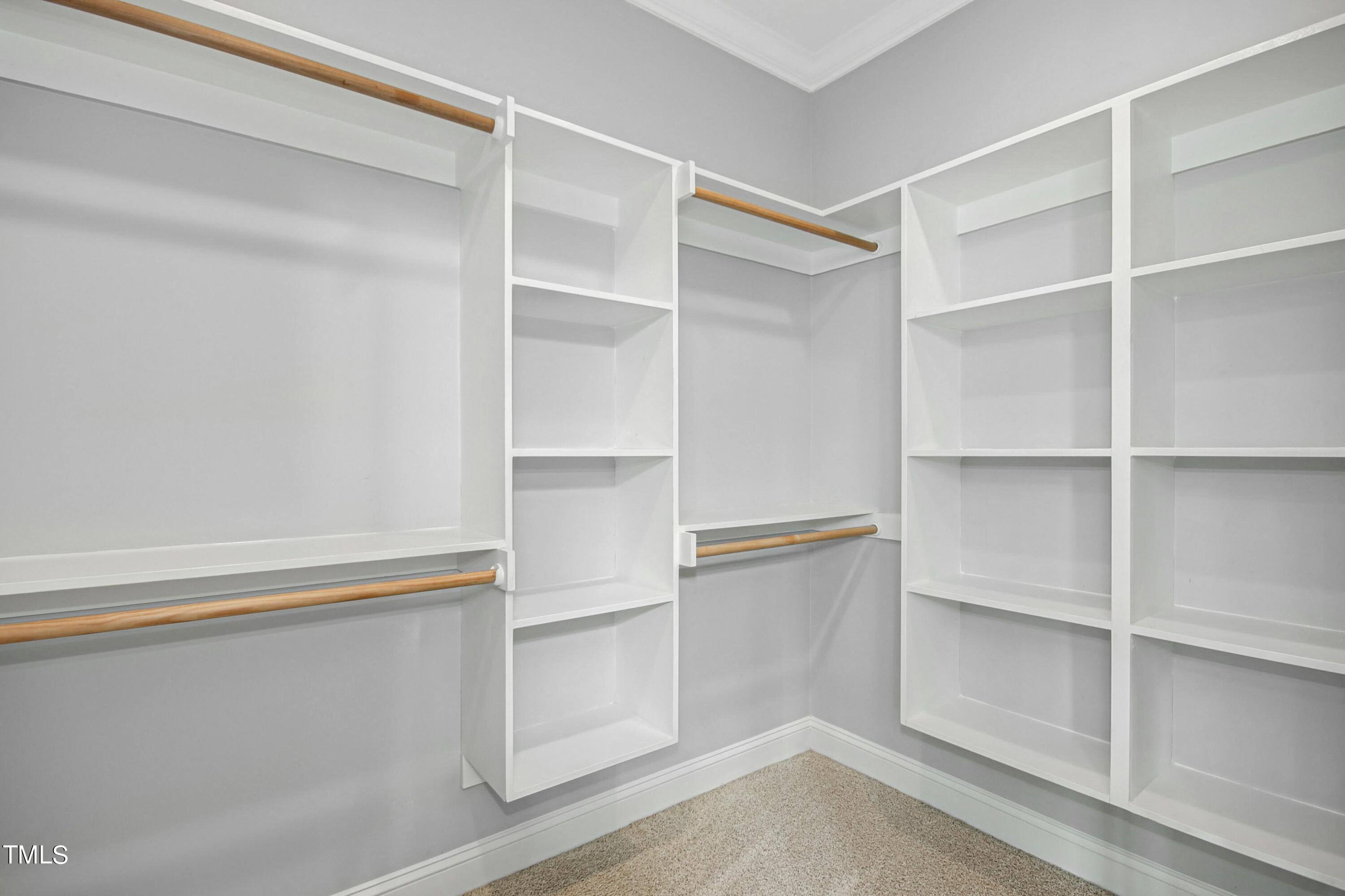 512 Peebles Street Raleigh, NC 27608 - Photo 31 of 45 a view of an empty walk in closet