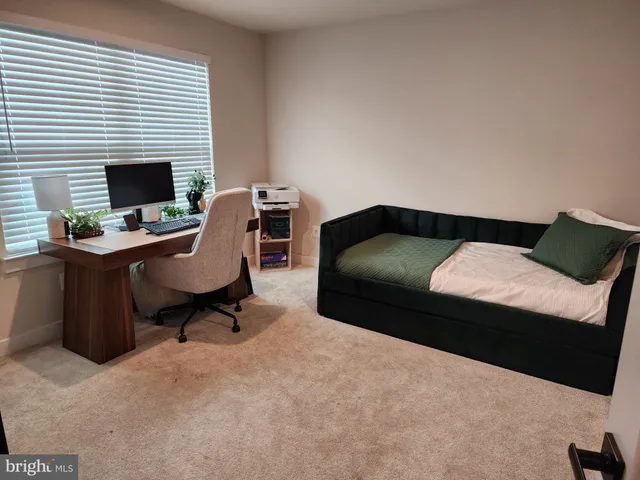 a view of a terrace with furniture and stove