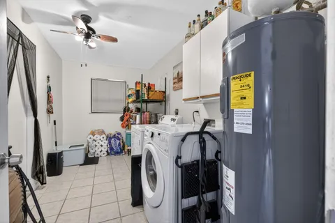 a view of living room with washer and dryer