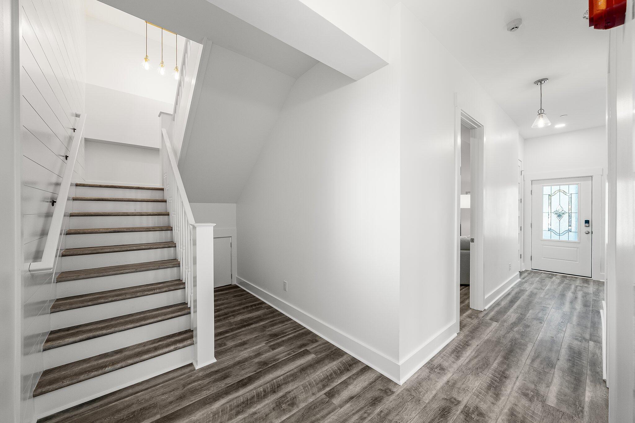 8711 Surf Drive Panama City, FL 32408 - Photo 22 of 81 1st Floor Stairs