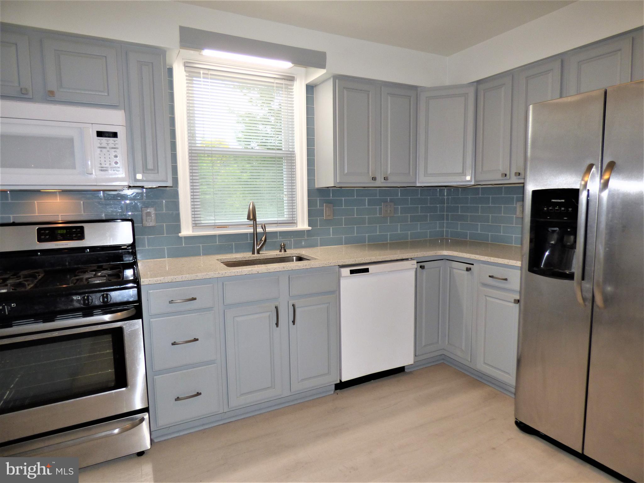 8033 Hammond Road Cheltenham, PA 19012 - Photo 11 of 38 Updated Kitchen- Refreshed Cabinetry