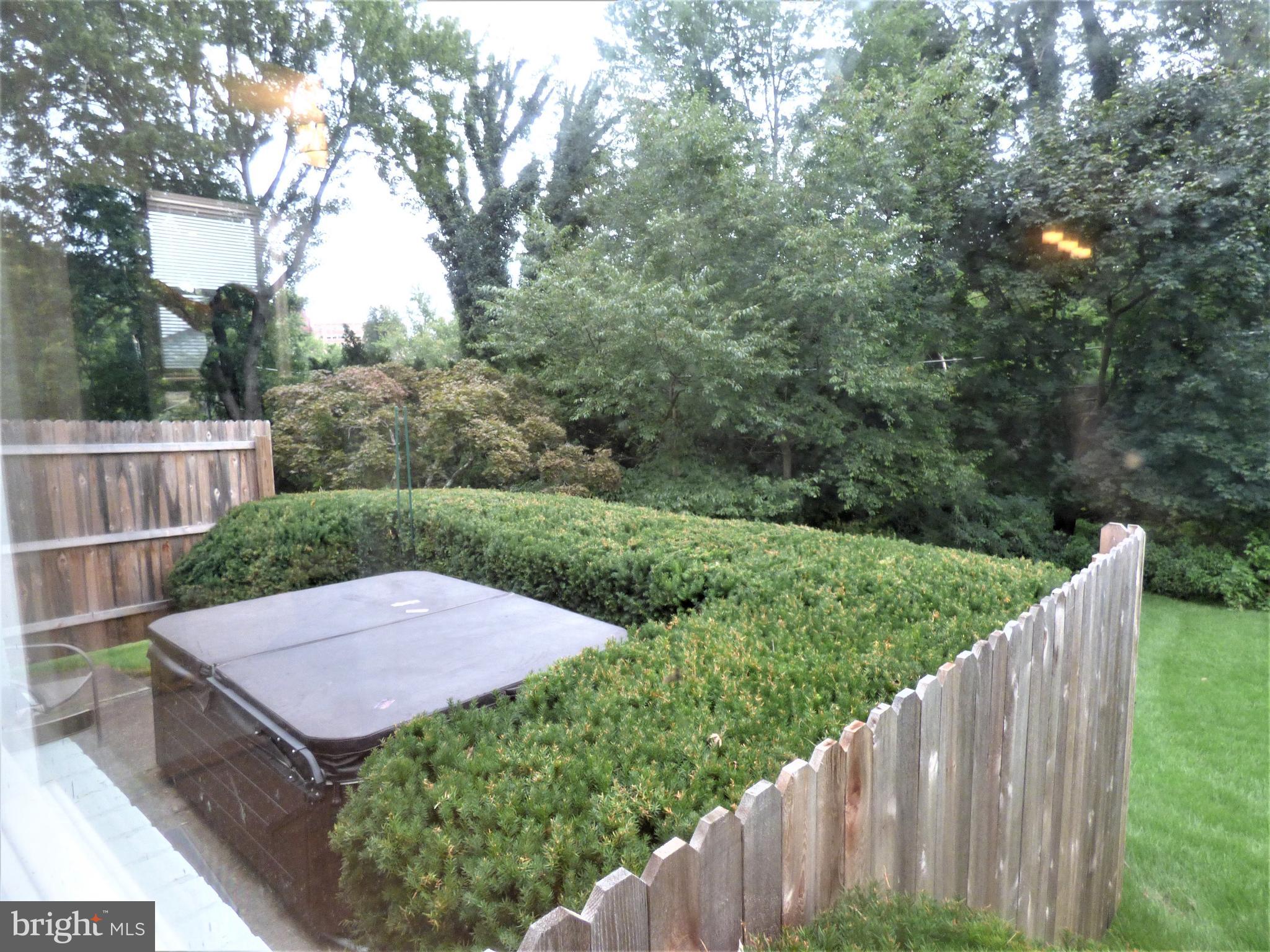 8033 Hammond Road Cheltenham, PA 19012 - Photo 35 of 38 Hot Tub with Privacy Fencing in Rear