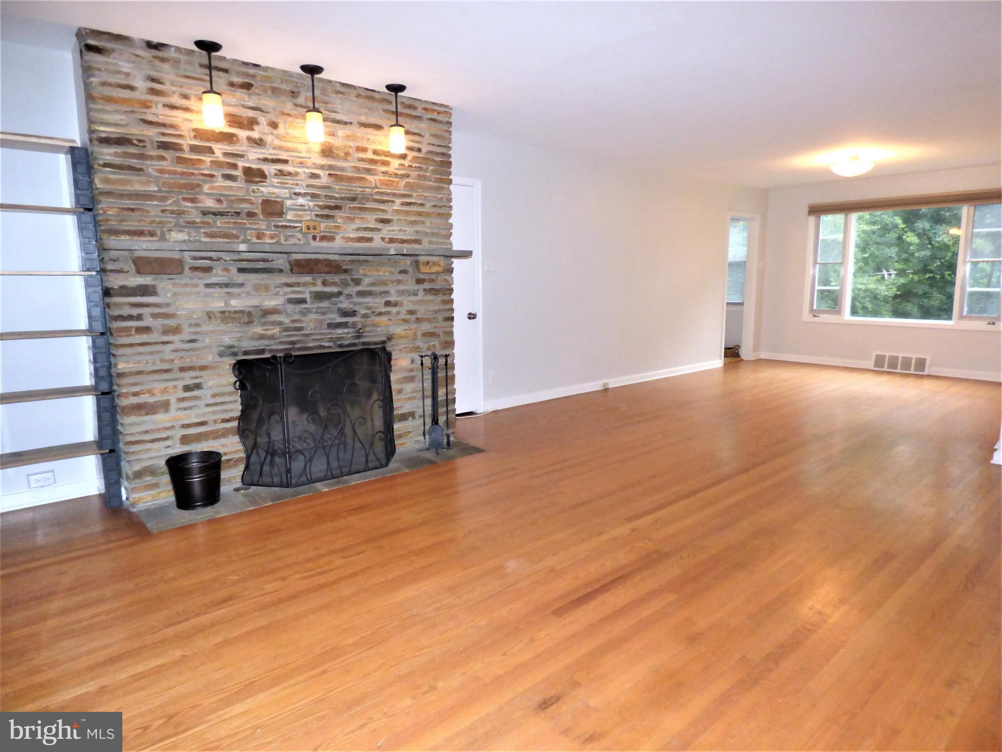 8033 Hammond Road Cheltenham, PA 19012 - Photo 5 of 38 Living Room opens to Dining Room