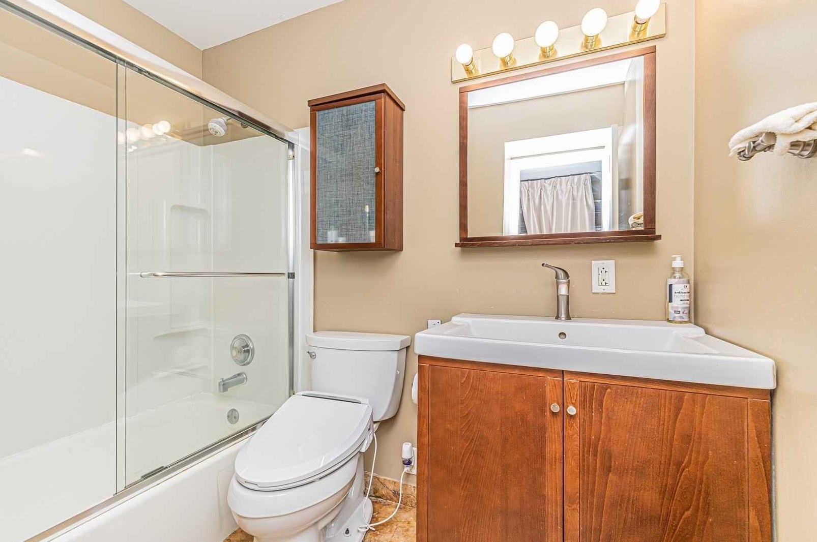 1345 Hassell Drive Hoffman Estates, IL 60169 - Photo 17 of 36 a bathroom with a granite countertop sink toilet and shower