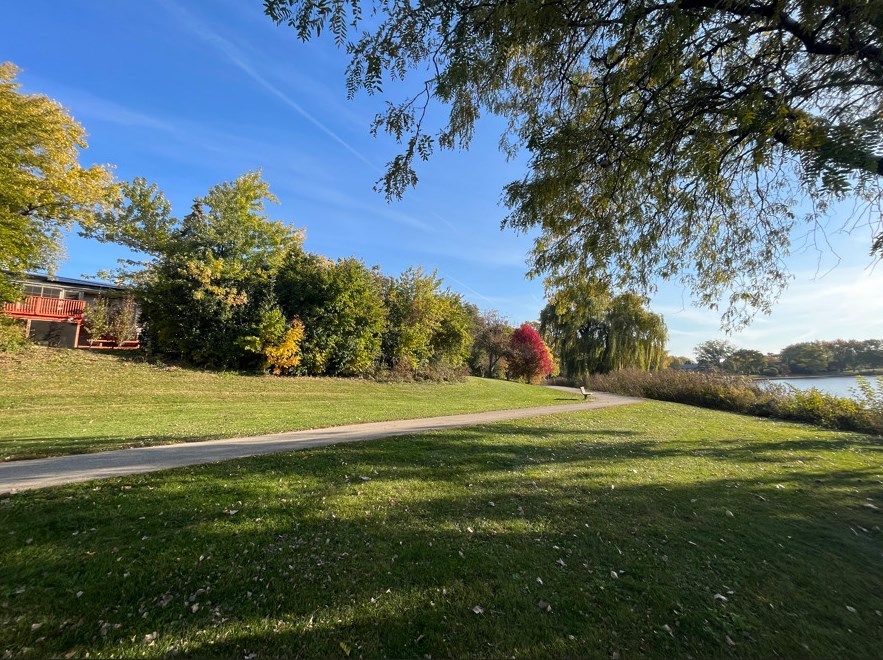 1345 Hassell Drive Hoffman Estates, IL 60169 - Photo 32 of 36 a view of a golf course with a lake