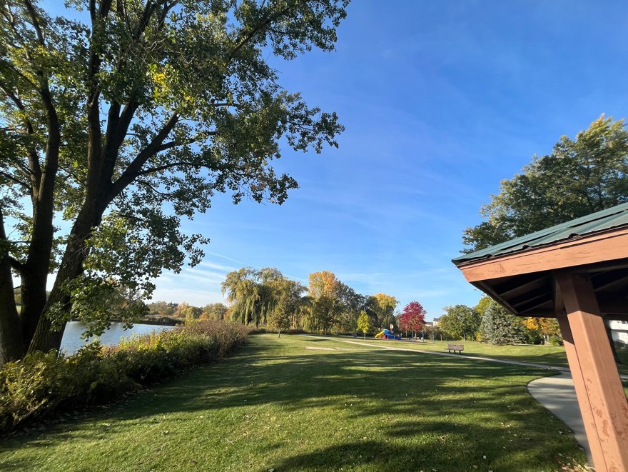 1345 Hassell Drive Hoffman Estates, IL 60169 - Photo 33 of 36 a view of a golf course with a lake