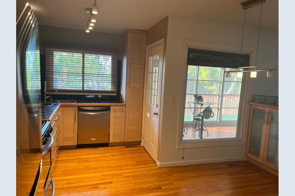 1345 Hassell Drive Hoffman Estates, IL 60169 - Photo 4 of 36 a view of an empty room with a window