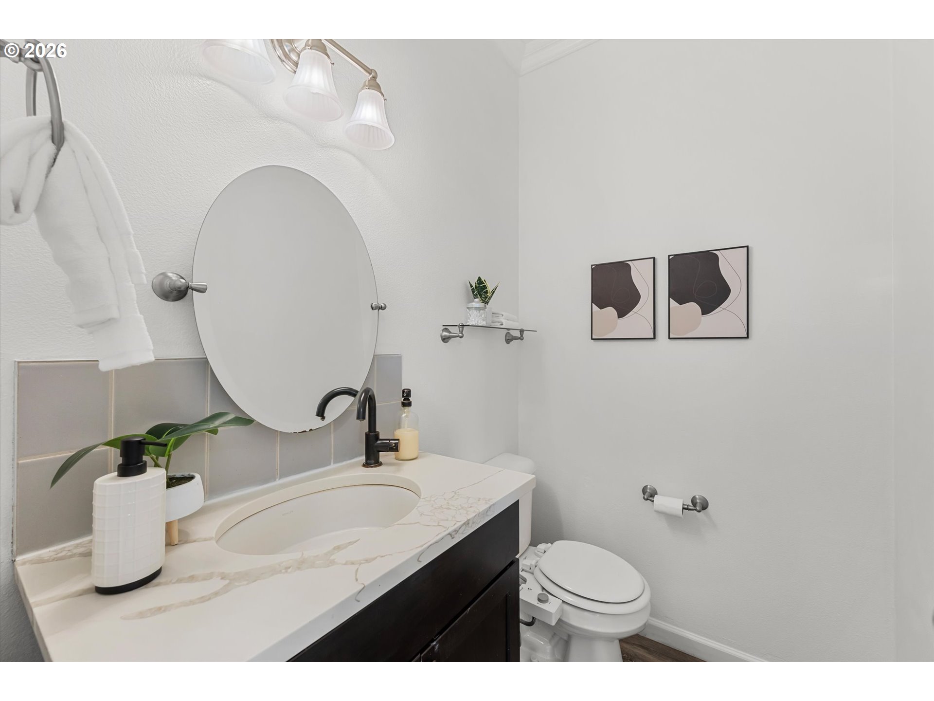 1944 Southwest 20th Court Gresham, OR 97080 - Photo 22 of 48 a bathroom with a granite countertop sink and a mirror