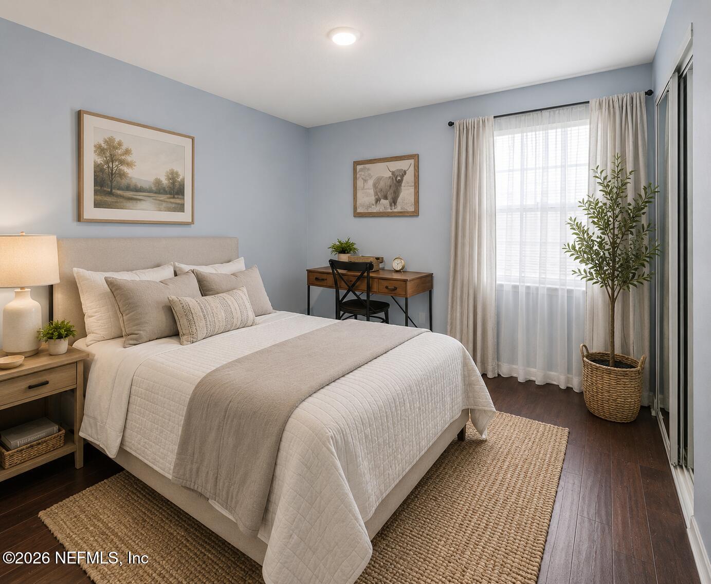 717 Estates Cove Road Jacksonville, FL 32221 - Photo 31 of 41 a bedroom with a balcony a bed and a view of balcony
