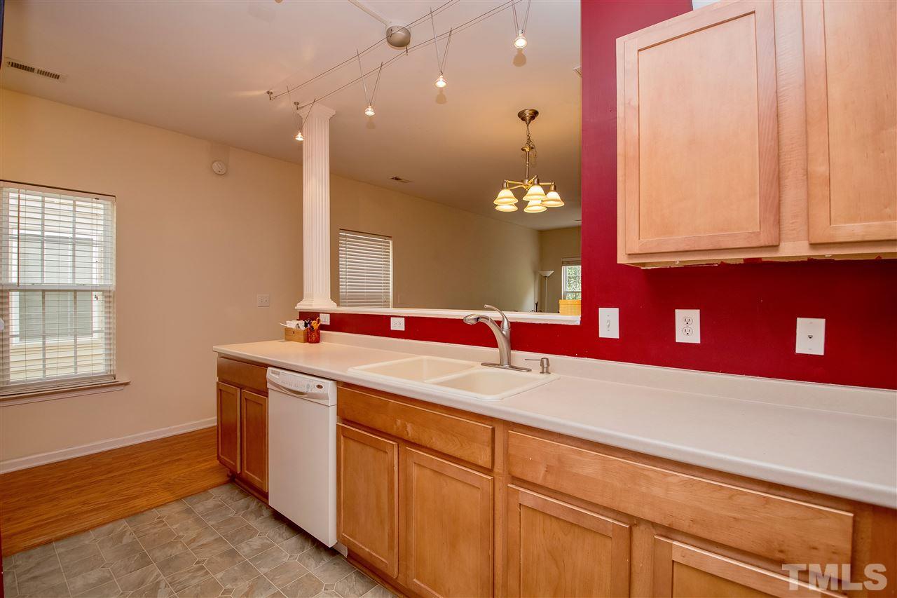 2135 Metacomet Way Raleigh, NC 27604 - Photo 11 of 25 a bathroom with a sink and a mirror