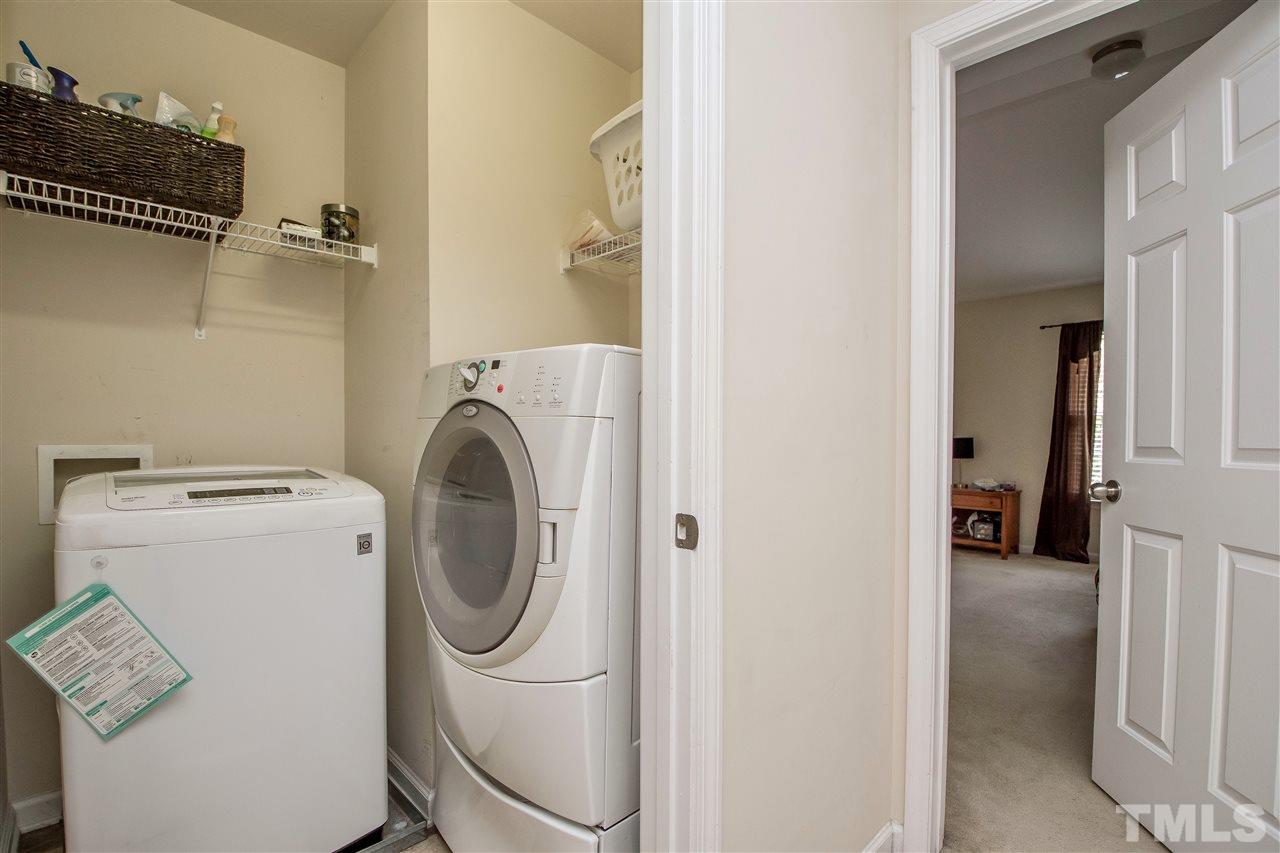 2135 Metacomet Way Raleigh, NC 27604 - Photo 18 of 25 a utility room with dryer and washer