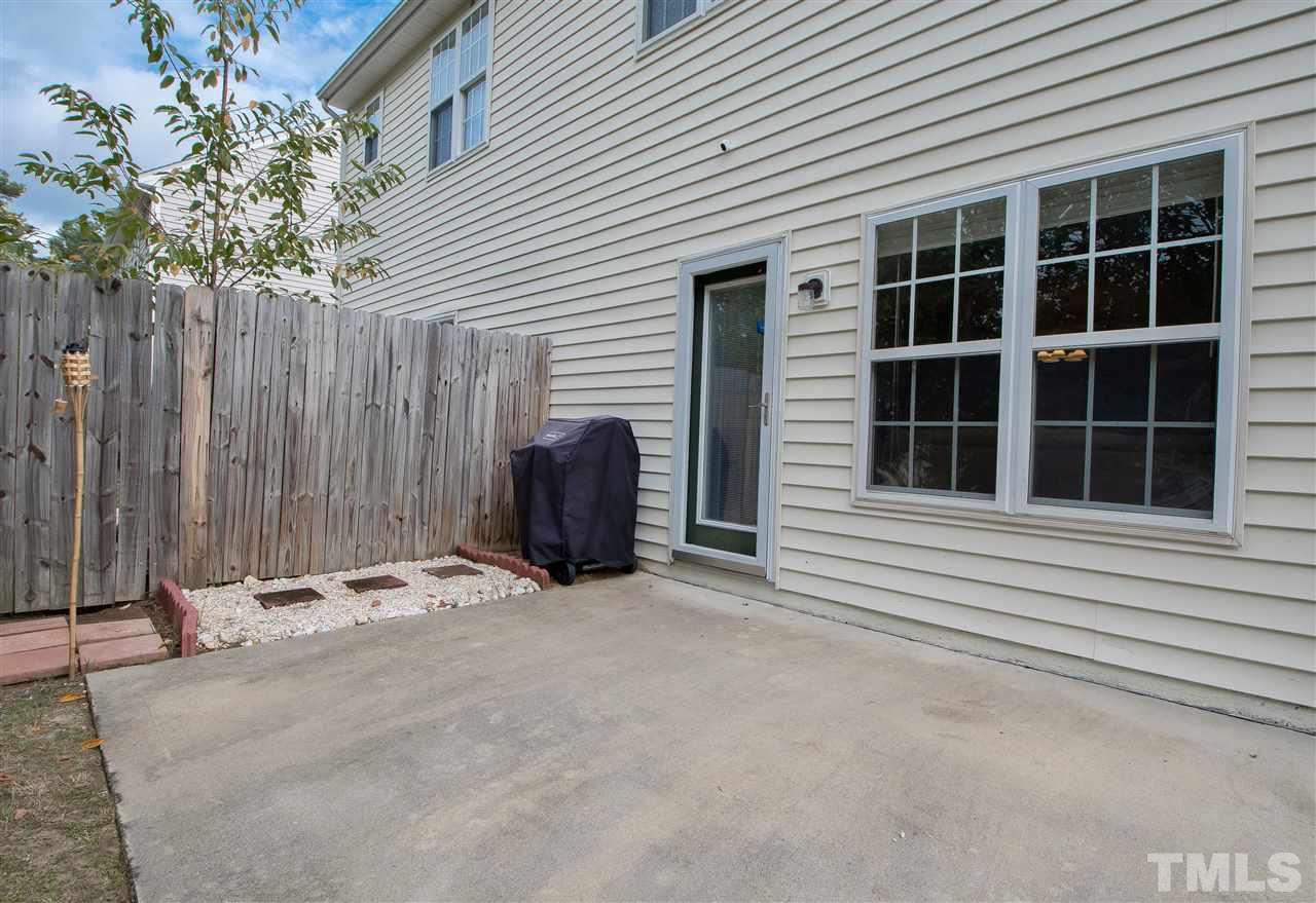 2135 Metacomet Way Raleigh, NC 27604 - Photo 22 of 25 a view of potted plants in front of a house