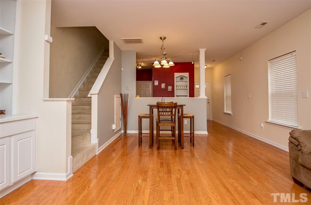 2135 Metacomet Way Raleigh, NC 27604 - Photo 5 of 25 a view of a dining room with furniture and chandelier