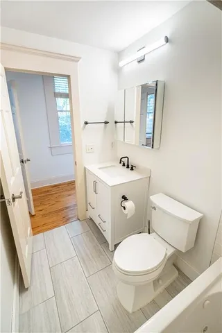 a picture of a bathroom with sink