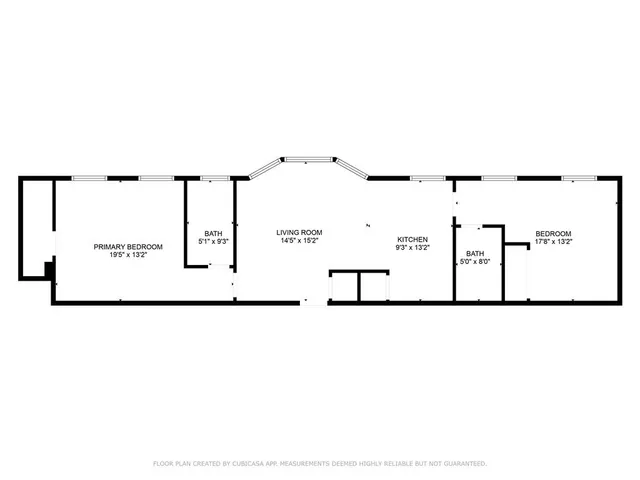 a view of a park with a large trees