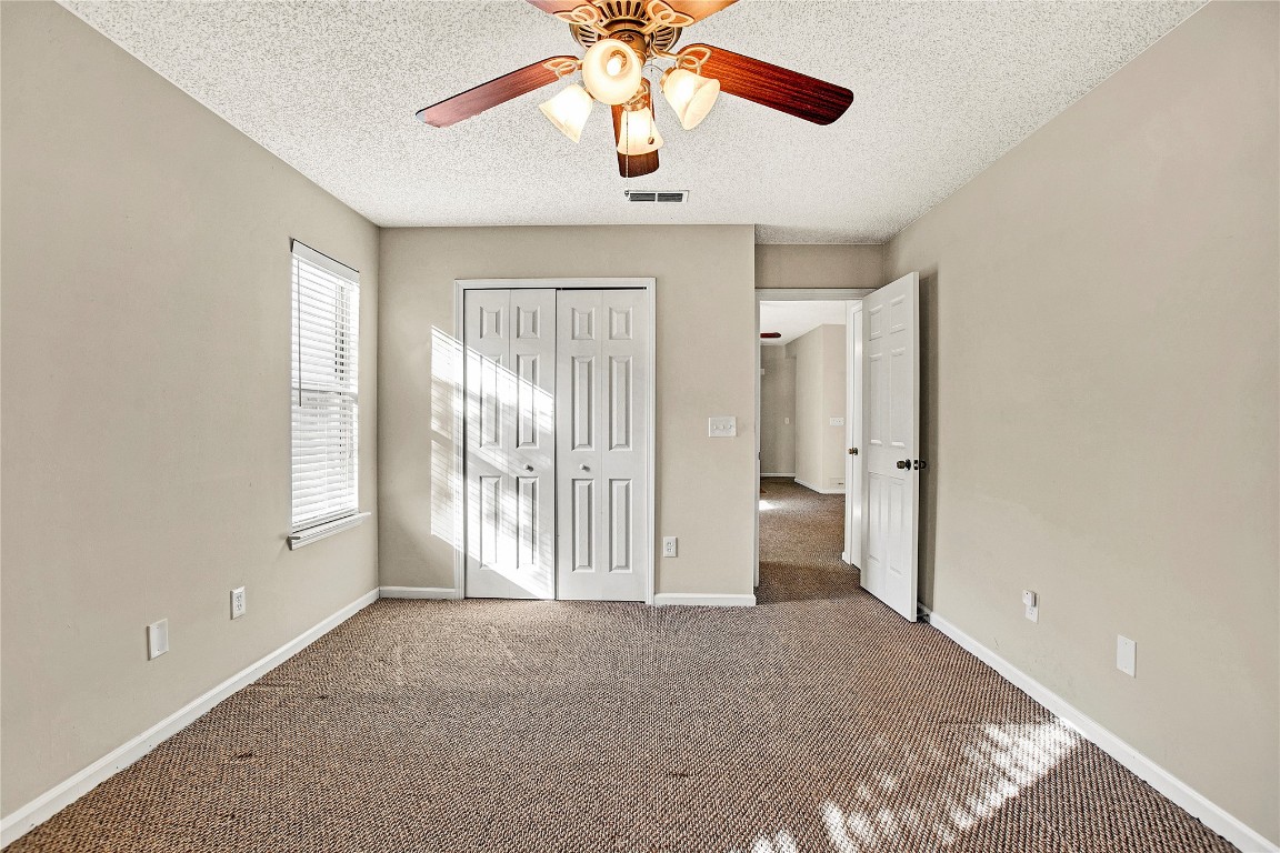 909 Gavagan Road Jacksonville, FL 32233 - Photo 16 of 17 a view of an empty room and window