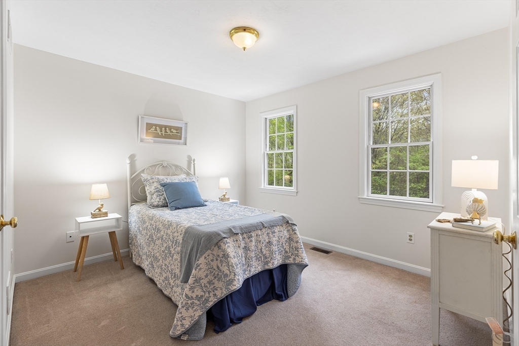 3 Wildflower Drive Sutton, MA 01590 - Photo 19 of 31 a bedroom with a bed and a window