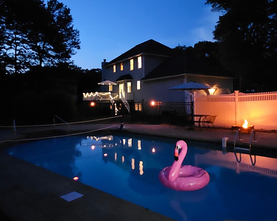 3 Wildflower Drive Sutton, MA 01590 - Photo 2 of 31 a front view of a house roof deck with seating space