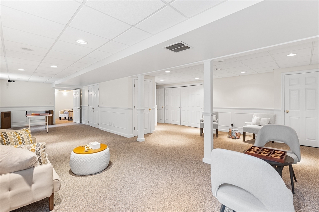 3 Wildflower Drive Sutton, MA 01590 - Photo 23 of 31 a room with a bed and gym equipment