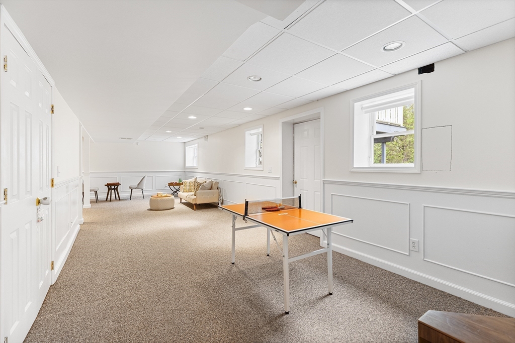 3 Wildflower Drive Sutton, MA 01590 - Photo 24 of 31 a living room with furniture a window and a table