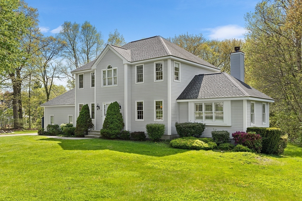 3 Wildflower Drive Sutton, MA 01590 - Photo 4 of 31 a front view of house with yard and green space