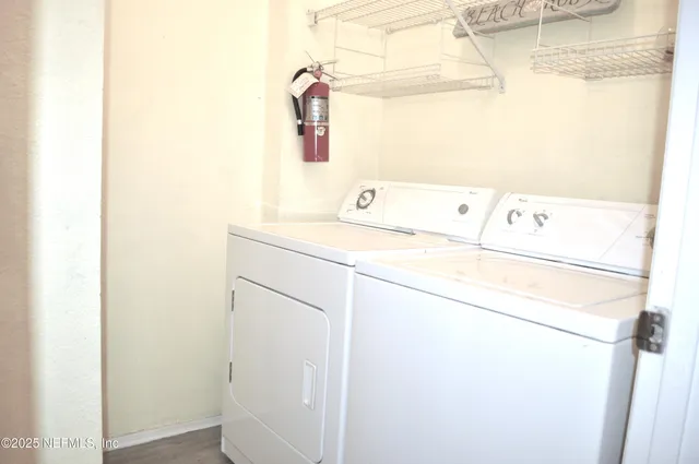 a utility room with dryer and washer