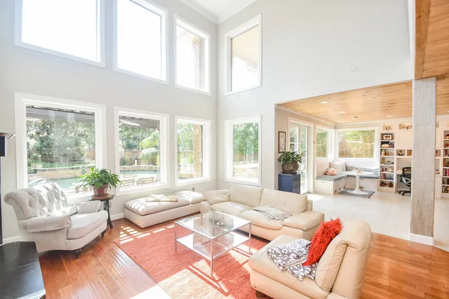 a living room with fireplace furniture and a fireplace
