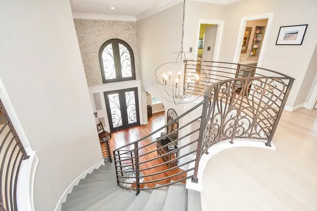 a view of entryway with wooden floor