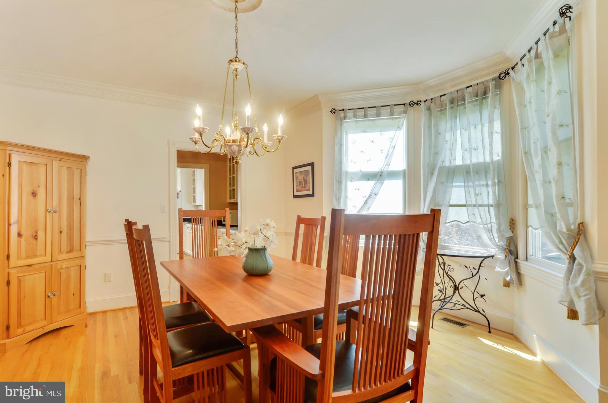 344 Little Quarry Road Gaithersburg, MD 20878 - Photo 7 of 30 Dining room w/hardwood, moldings & bay window